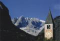 <b>Il campanile della Pieve, ben inserito nell'ambiente circostante: sullo sfondo la Cima Tosa del Gruppo delle Dolomiti di Brenta.</b> - Un campanile... Centro di una comunità che si raduna a lodare Dio e ad ascoltarlo!